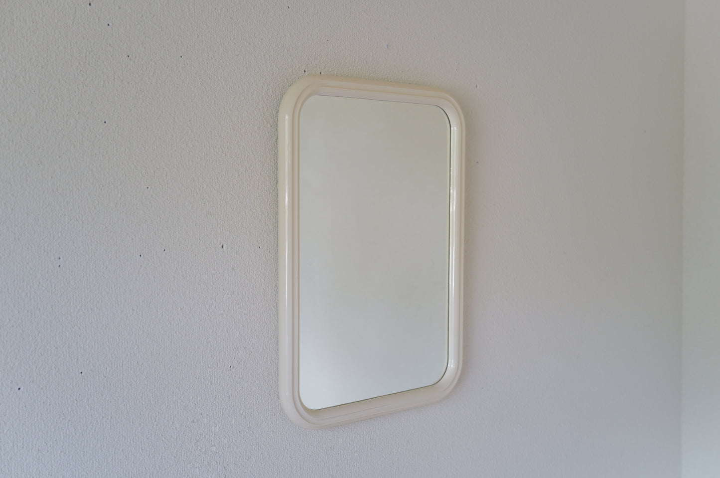 Vintage 1970s space age wall mirror