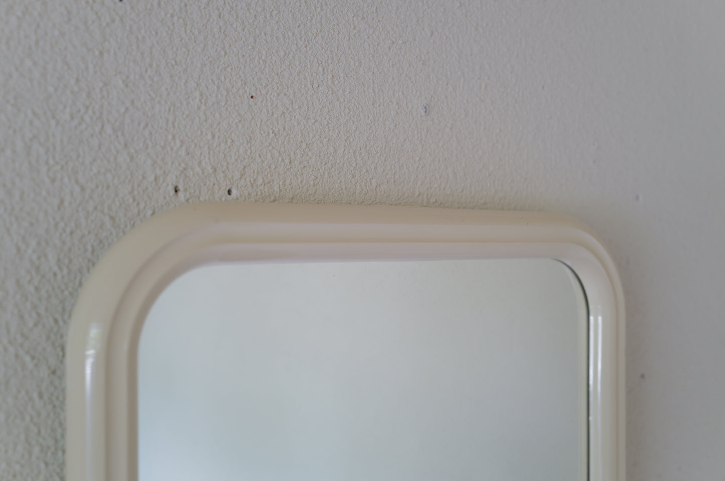 Vintage 1970s space age wall mirror
