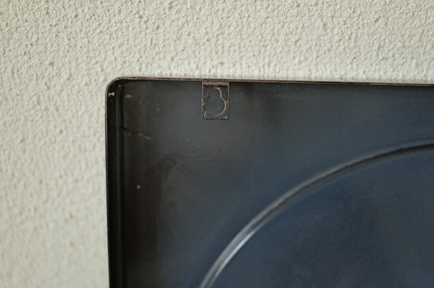 1960s, black enamel metal mirror France