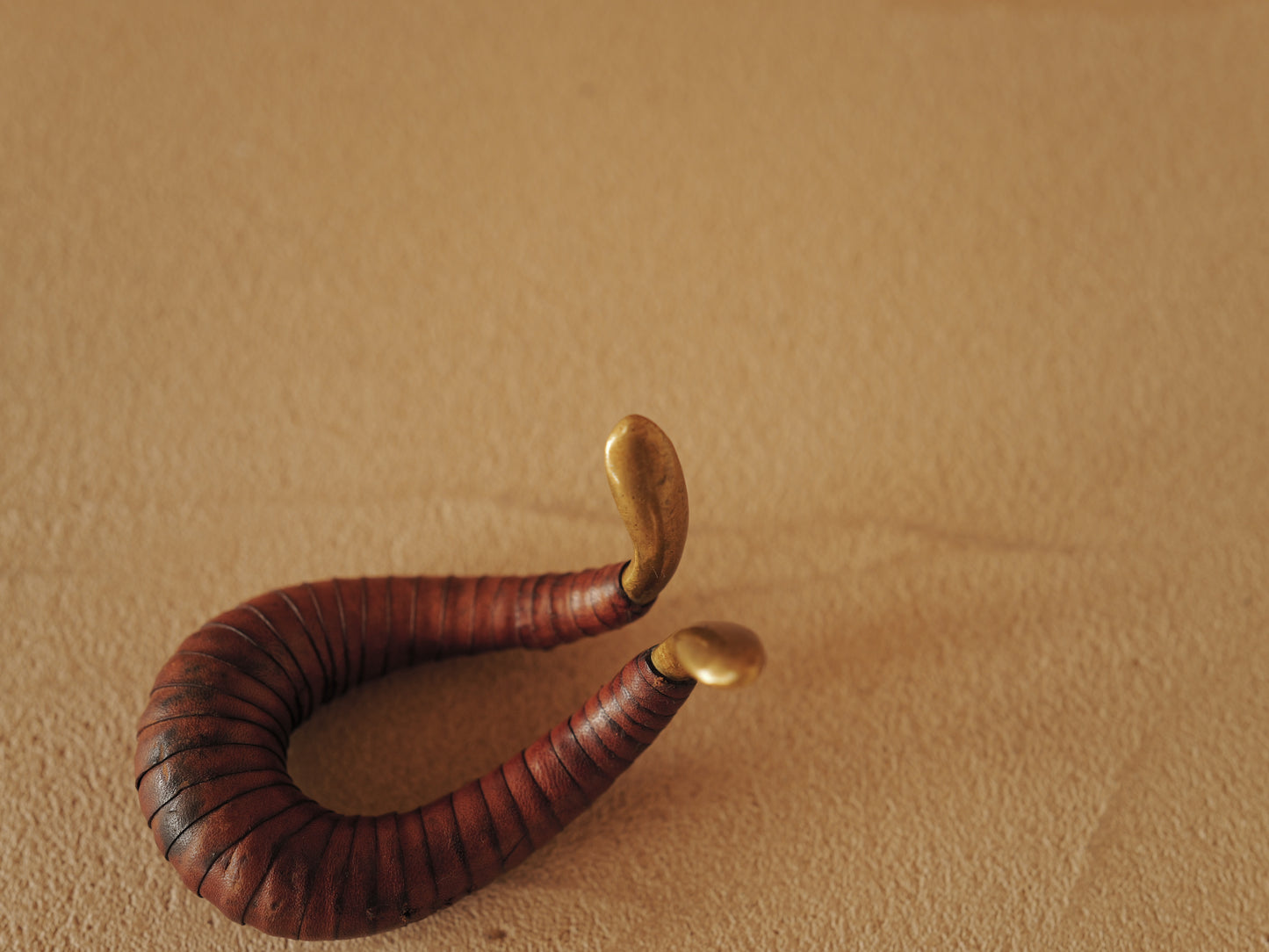 Carl Auböck brass and leather pipe holder Model 3294