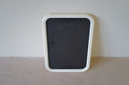 Vintage 1970s space age wall mirror