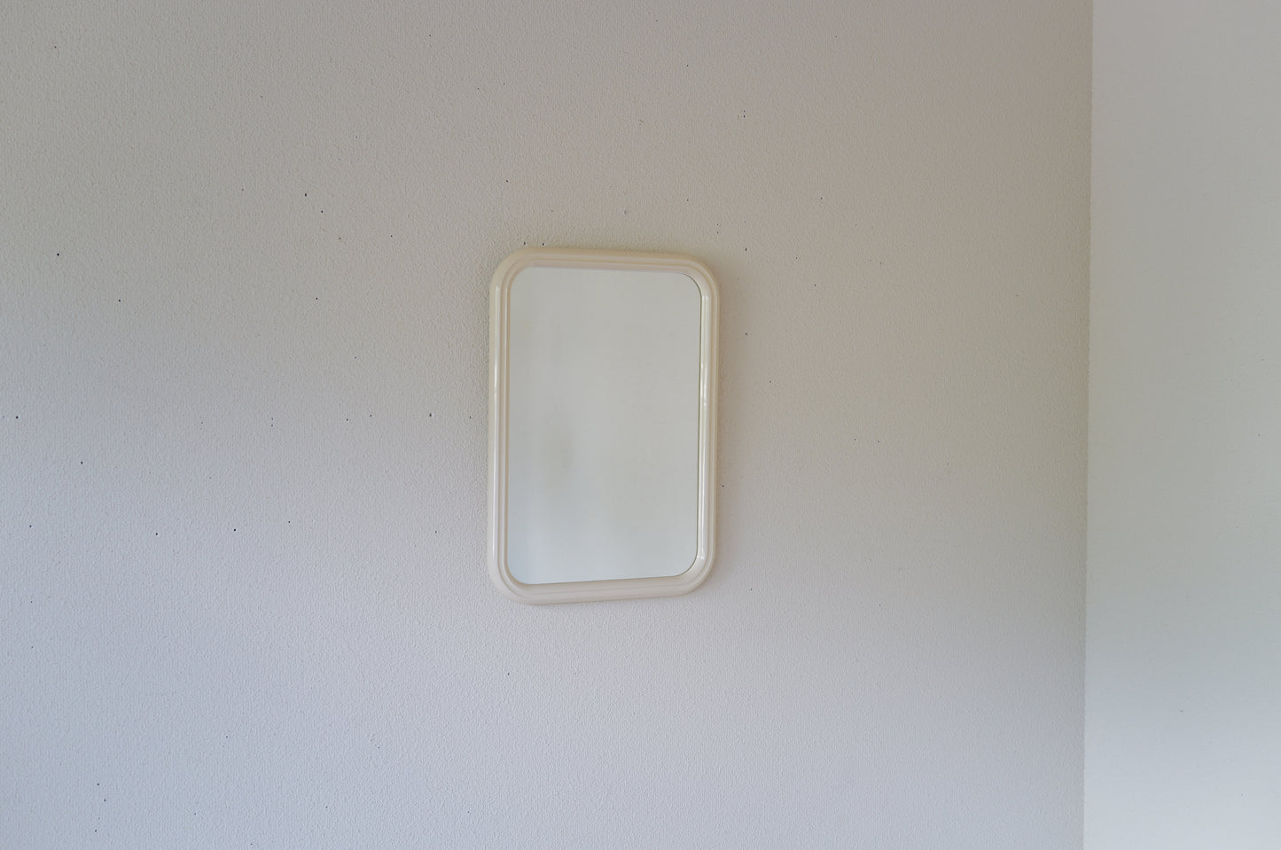 Vintage 1970s space age wall mirror