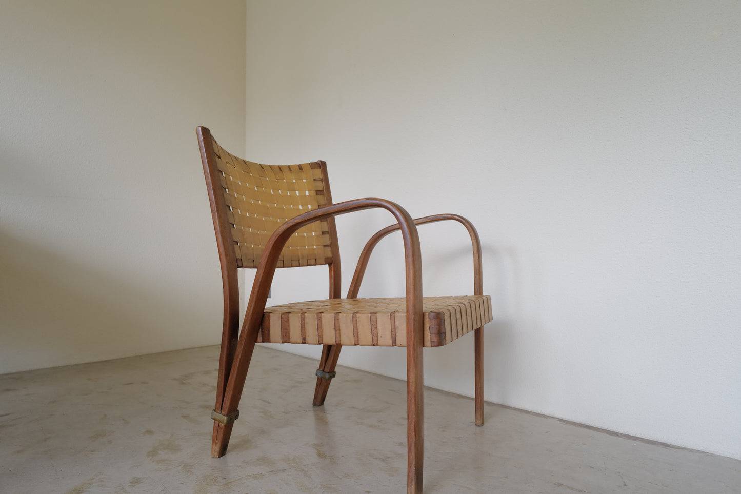 Bow wood armchair  by Hugues Steiner 1950s