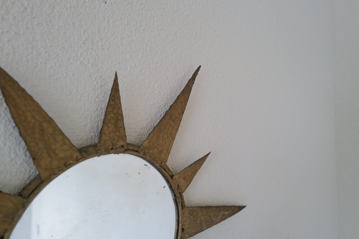 Small vintage sun mirror in gold metal. Handcrafted 50s 60s