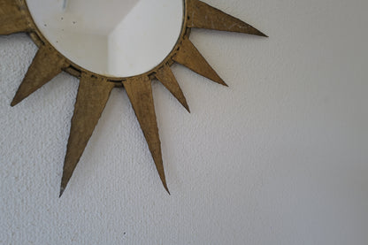 Small vintage sun mirror in gold metal. Handcrafted 50s 60s