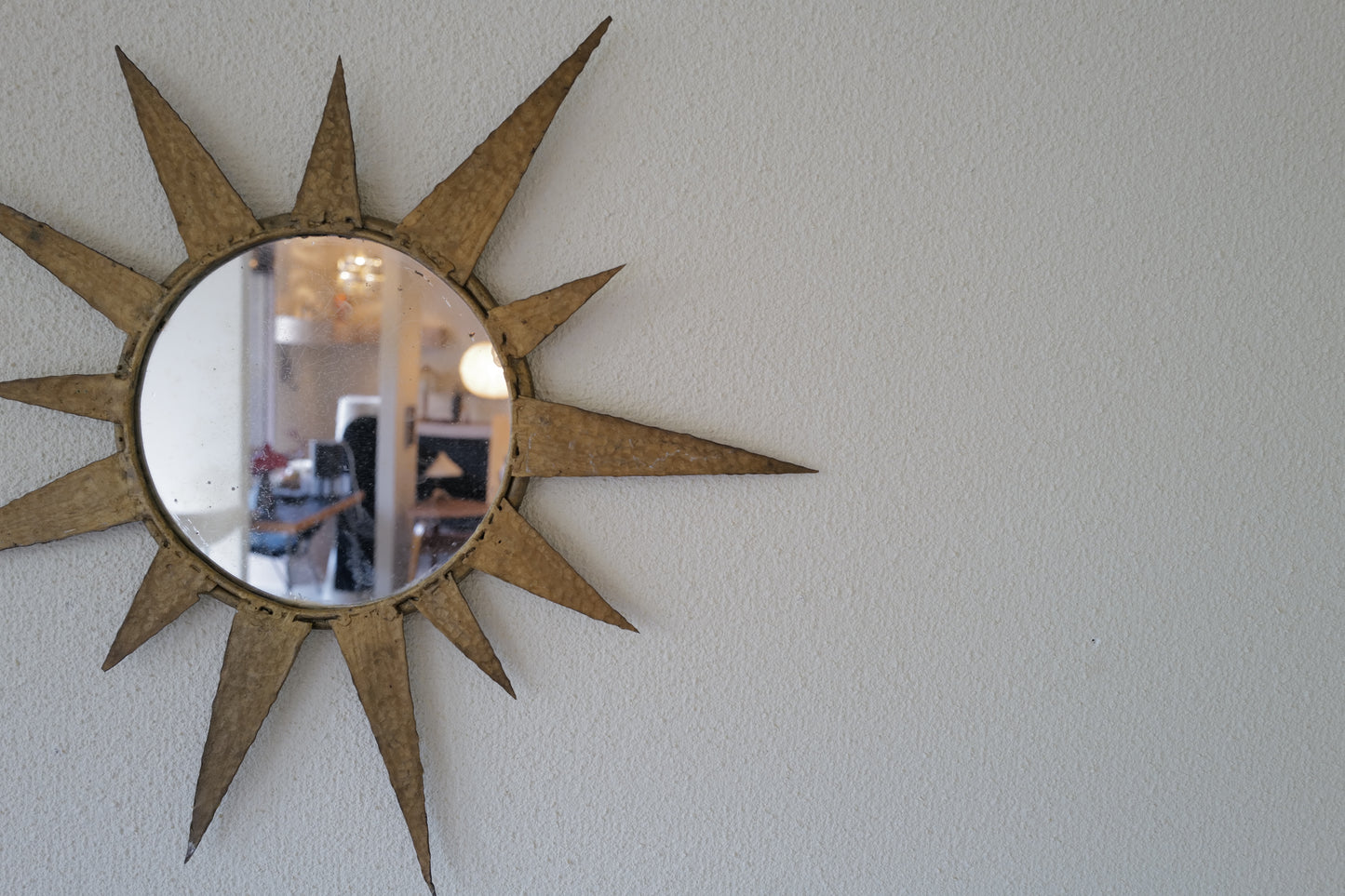 Small vintage sun mirror in gold metal. Handcrafted 50s 60s