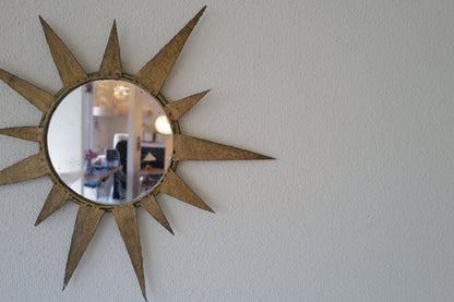 Small vintage sun mirror in gold metal. Handcrafted 50s 60s