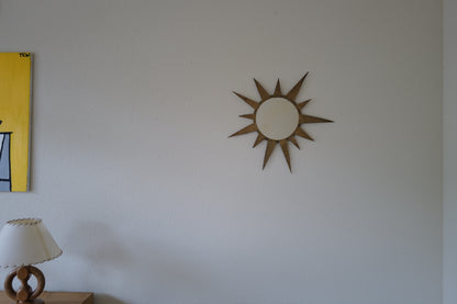 Small vintage sun mirror in gold metal. Handcrafted 50s 60s