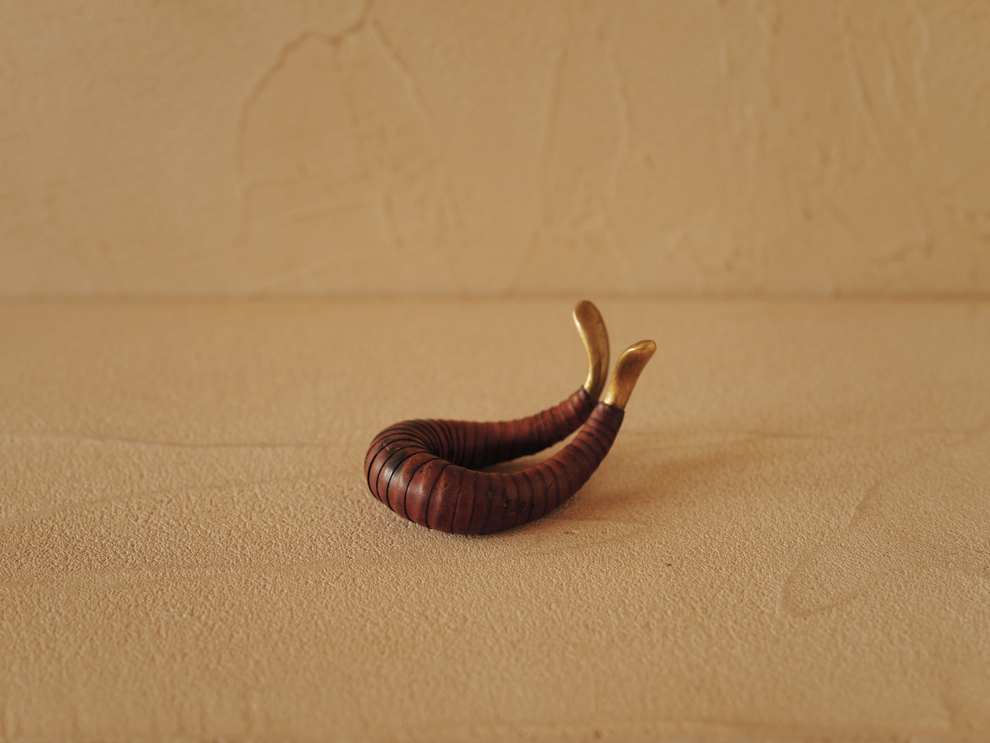 Carl Auböck brass and leather pipe holder Model 3294