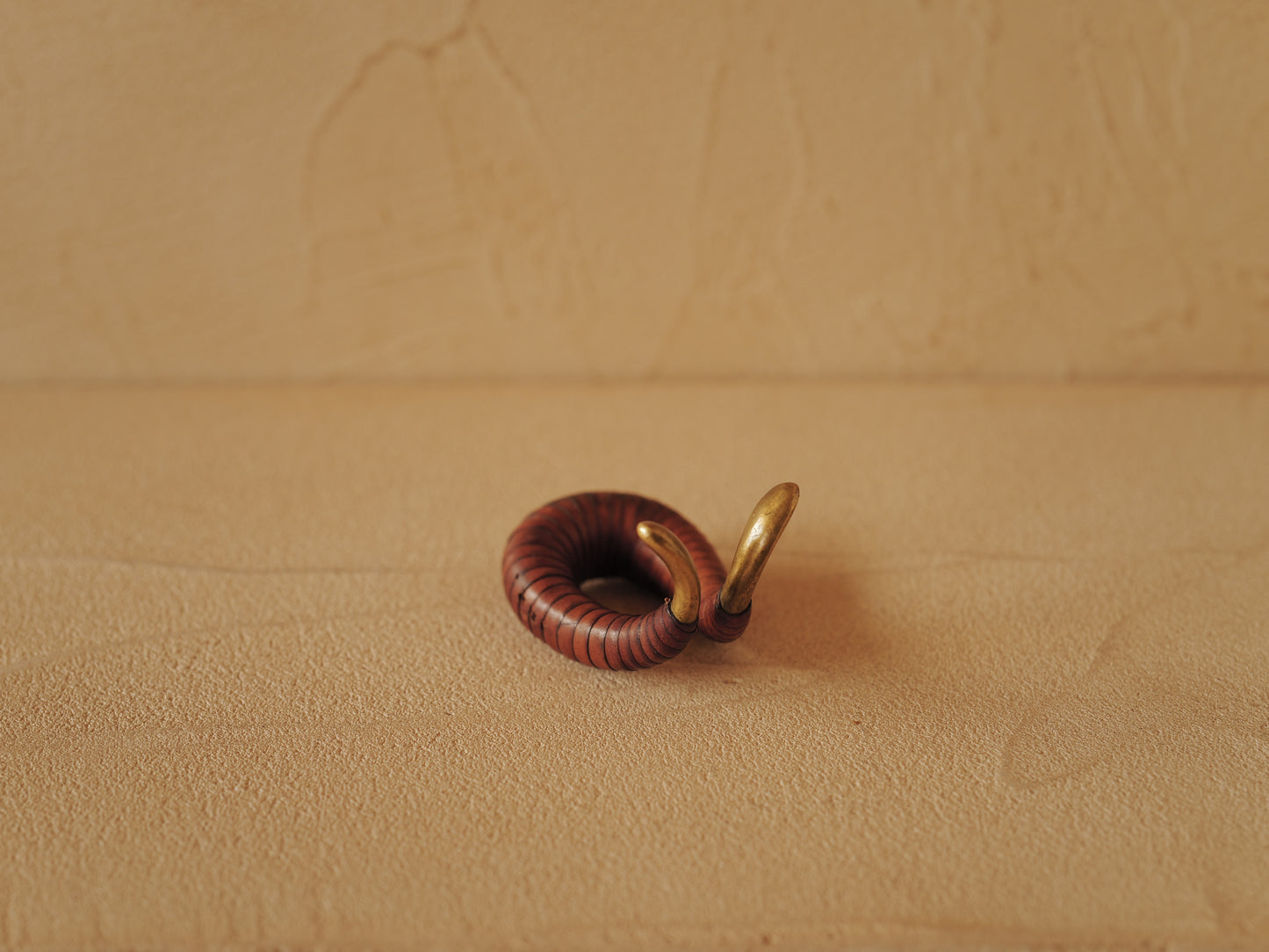 Carl Auböck brass and leather pipe holder Model 3294