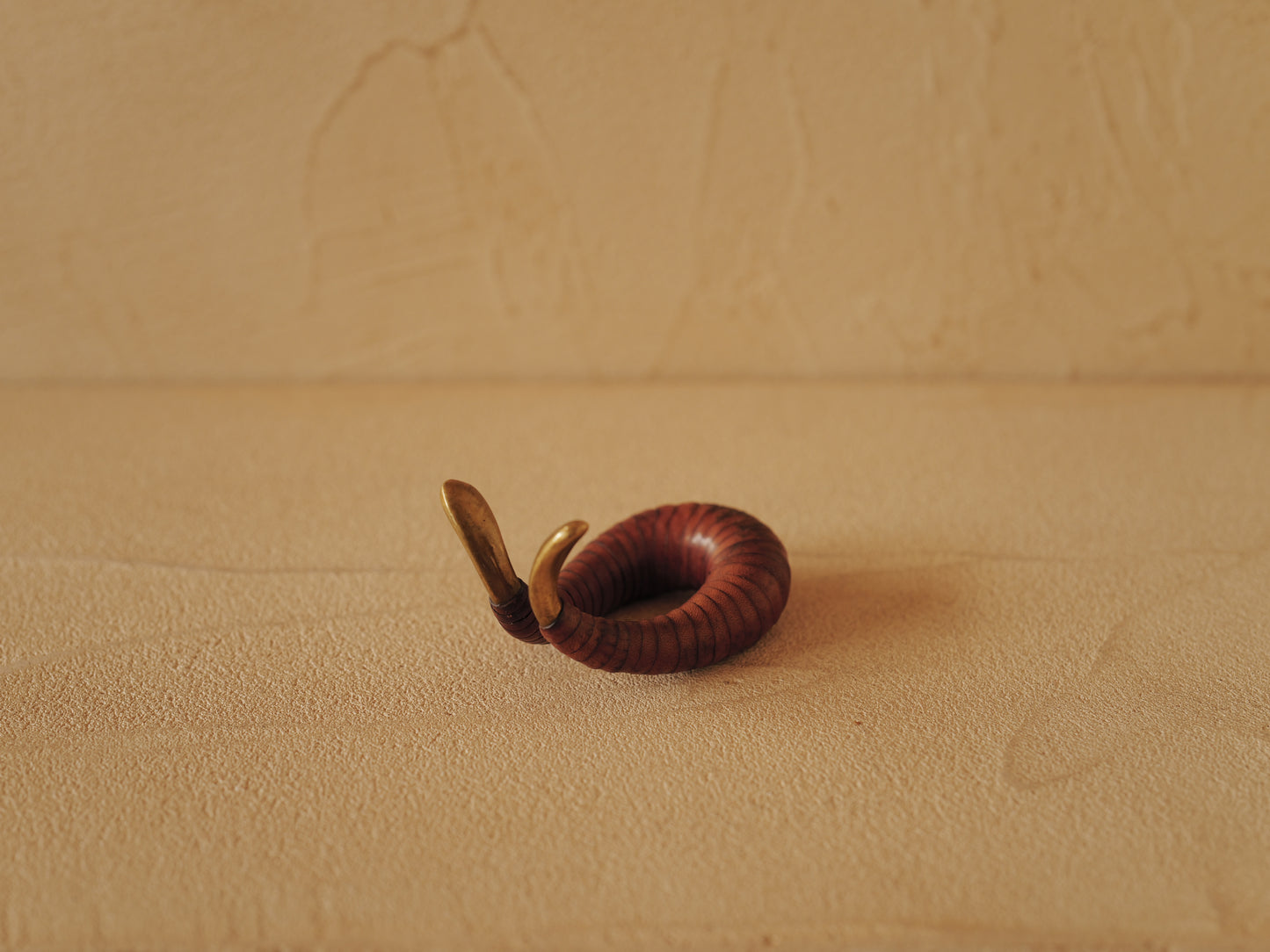 Carl Auböck brass and leather pipe holder Model 3294
