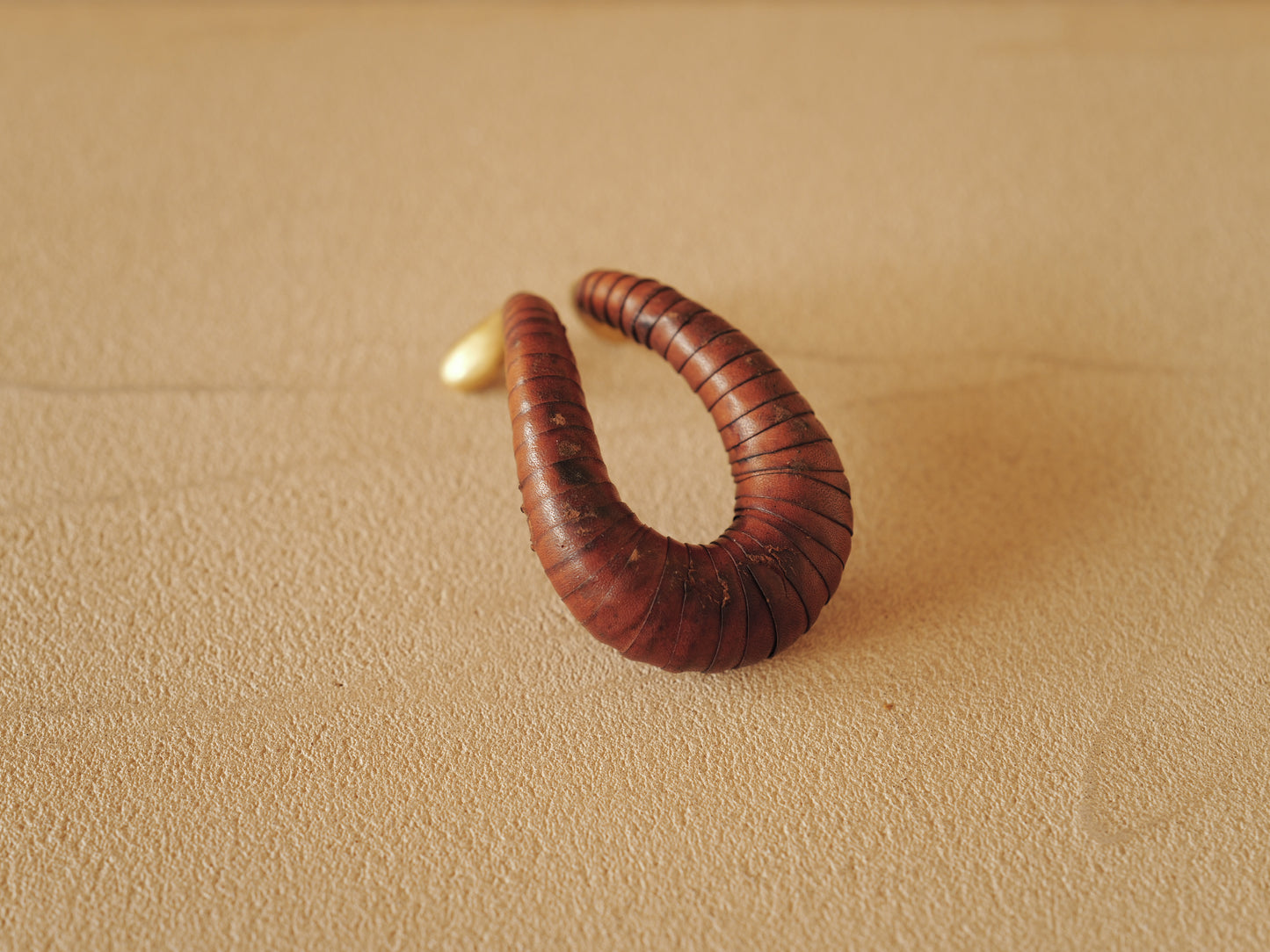 Carl Auböck brass and leather pipe holder Model 3294