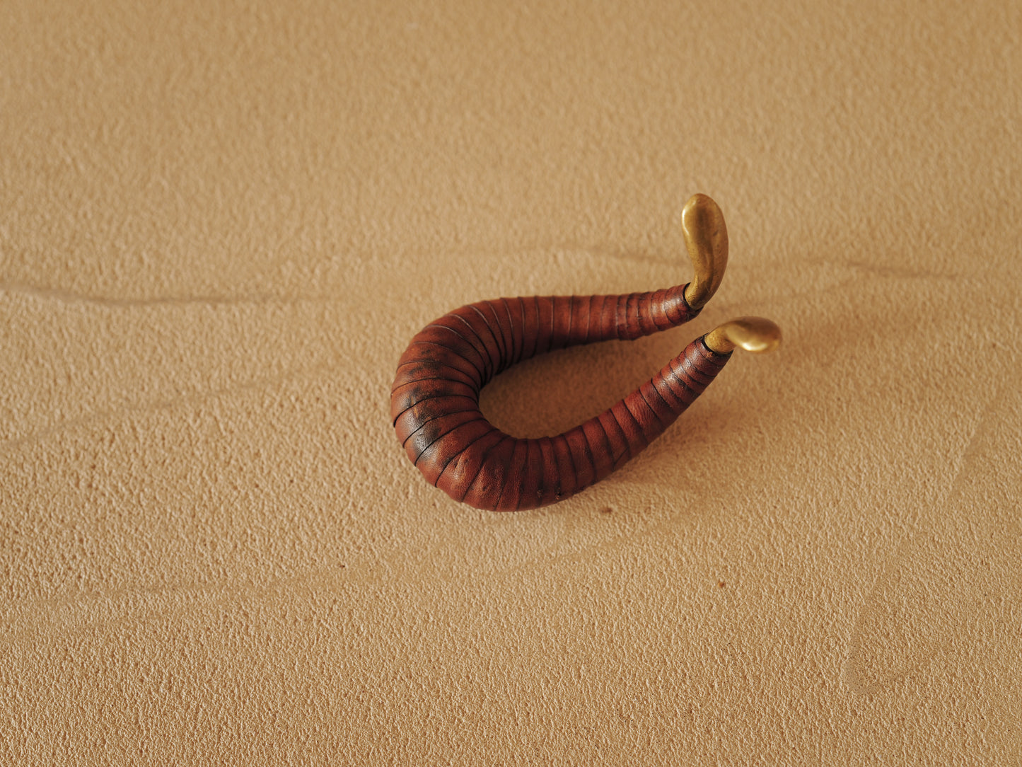 Carl Auböck brass and leather pipe holder Model 3294