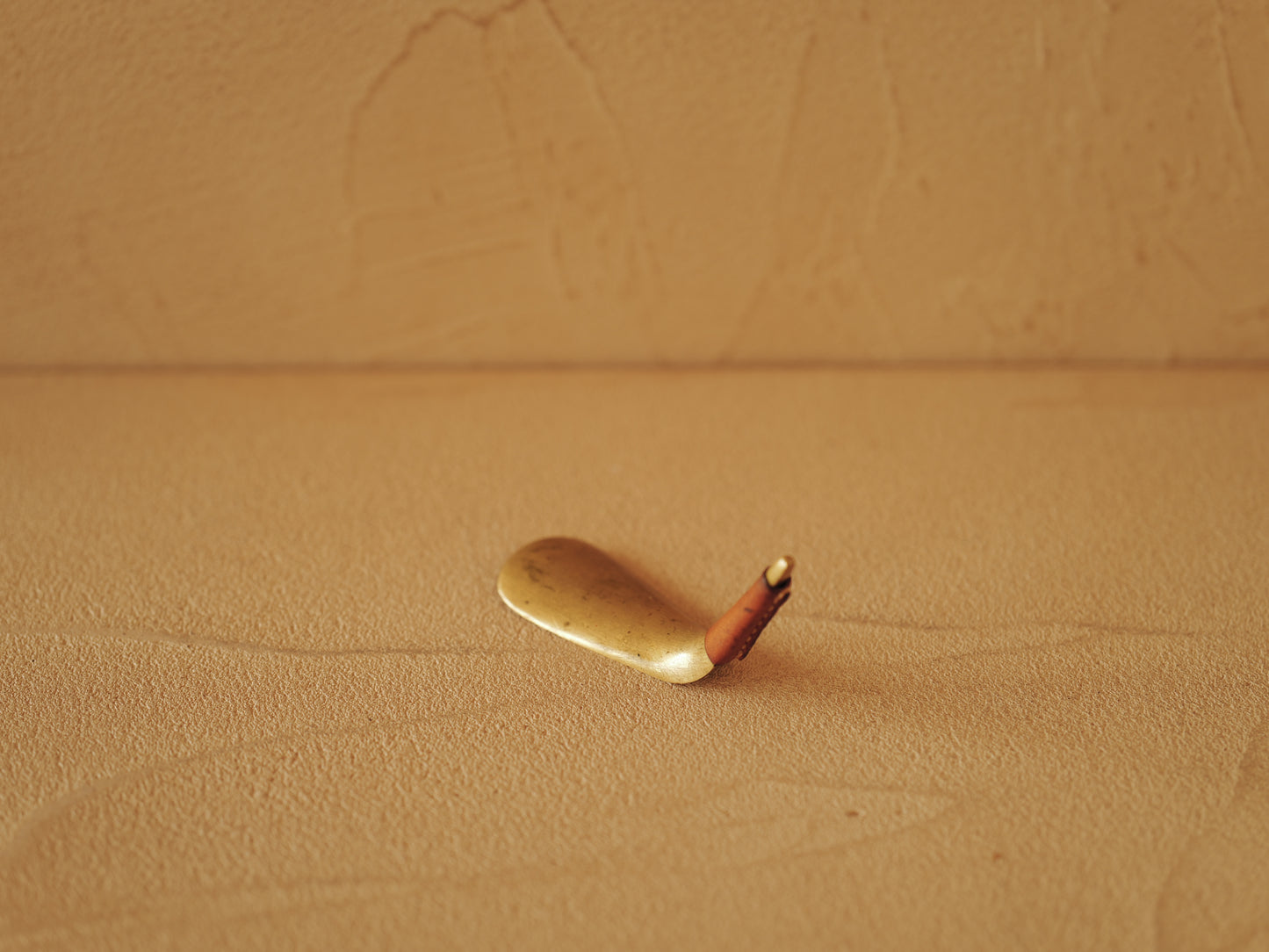 Carl Auböck  Brass shoe horn, handles covered with brown leather Modell 3658