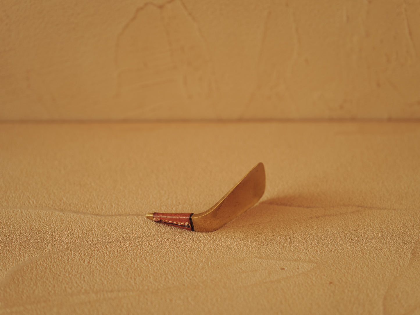 Carl Auböck  Brass shoe horn, handles covered with brown leather Modell 3658