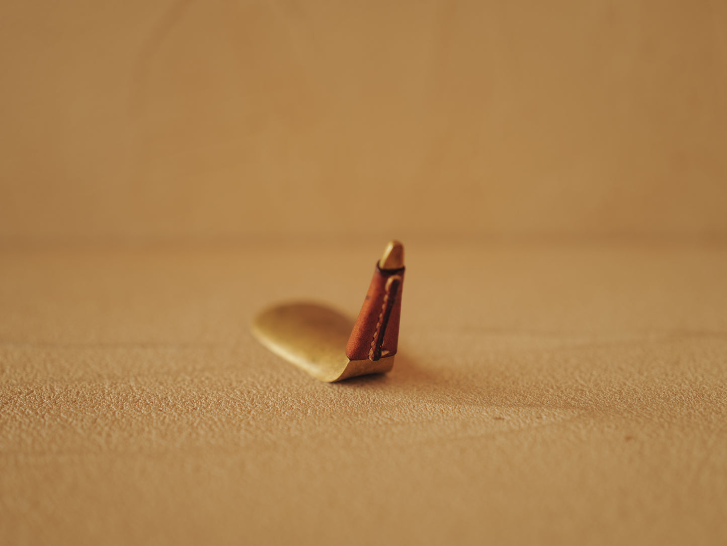 Carl Auböck  Brass shoe horn, handles covered with brown leather Modell 3658