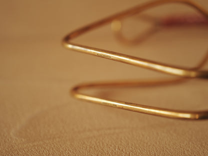Carl Auböck model 3601 bottle holders of brass, braided leather, Illums Bolighus, Denmark 1957