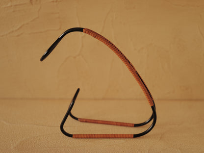 1960s Bottle holder in black lacquered metal wrapped with rattan