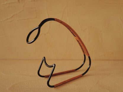 1960s Bottle holder in black lacquered metal wrapped with rattan