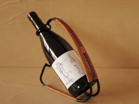 1960s Bottle holder in black lacquered metal wrapped with rattan