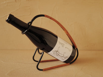 1960s Bottle holder in black lacquered metal wrapped with rattan