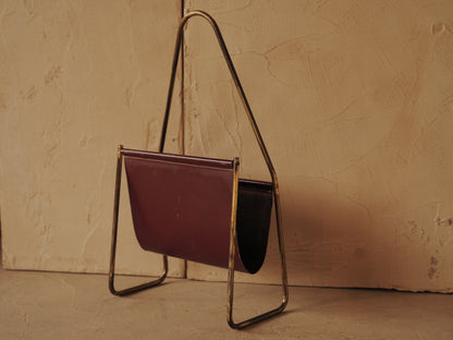 CARL AUBÖCK. Magazine holder in brass and leather, Austria