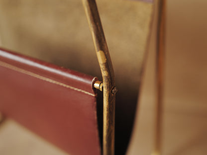 CARL AUBÖCK. Magazine holder in brass and leather, Austria