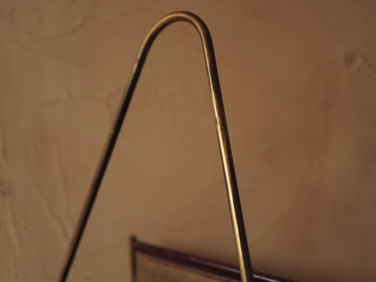 CARL AUBÖCK. Magazine holder in brass and leather, Austria