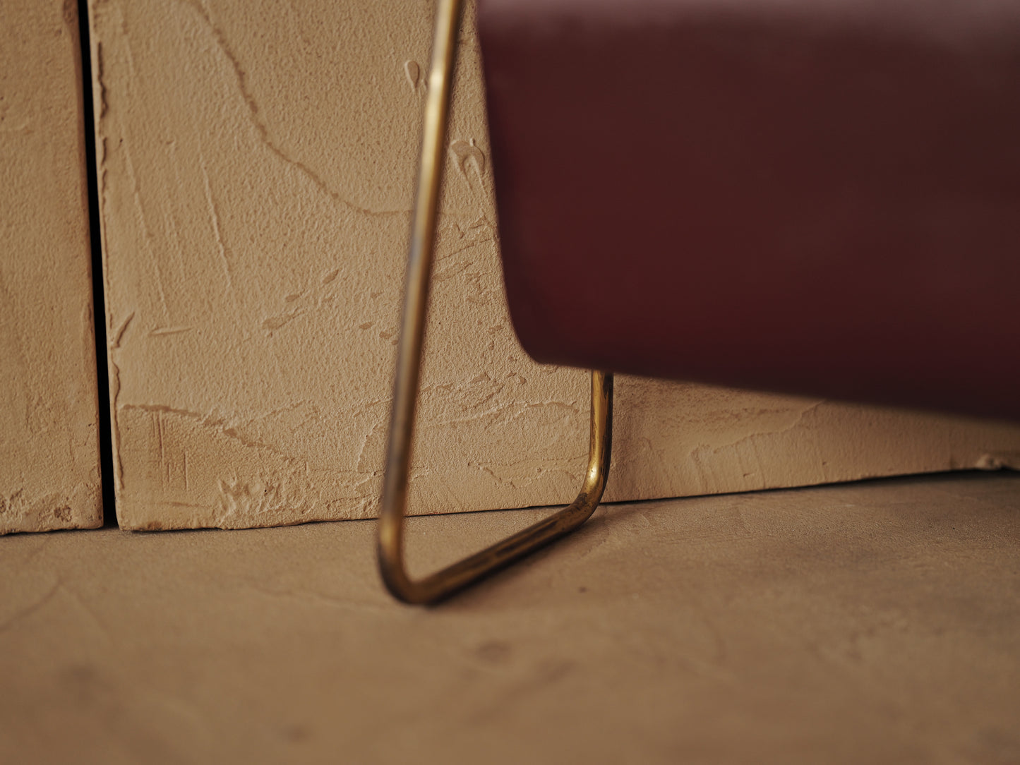 CARL AUBÖCK. Magazine holder in brass and leather, Austria