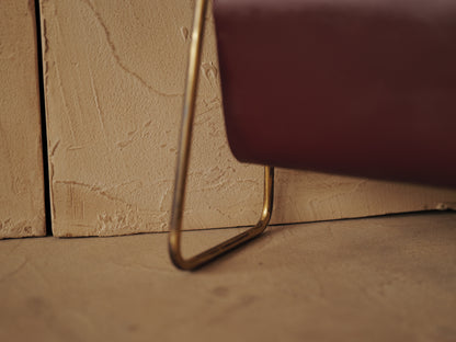 CARL AUBÖCK. Magazine holder in brass and leather, Austria