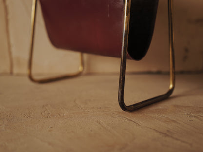 CARL AUBÖCK. Magazine holder in brass and leather, Austria