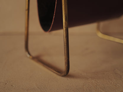 CARL AUBÖCK. Magazine holder in brass and leather, Austria