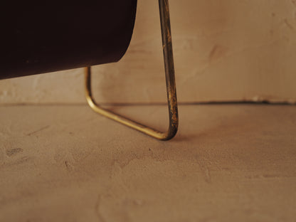CARL AUBÖCK. Magazine holder in brass and leather, Austria